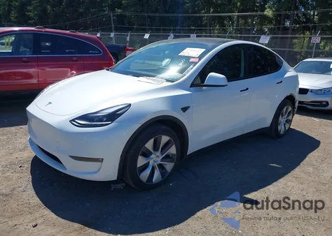 2023 Tesla Model Y Awd/Long Range Dual Motor All-Wheel Drive z USA, uszkodzony, nr VIN 7SAYGAEE1PF700262